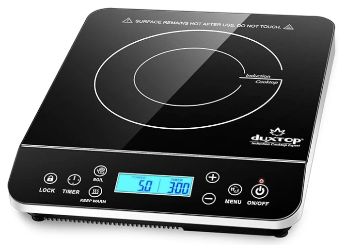 induction vs electric cooktop energy savings, induction vs electric cost comparison 2026, energy efficient cooking, save money on kitchen electric bill, induction-ready cookware, Sarah Jenkins kitchen tech