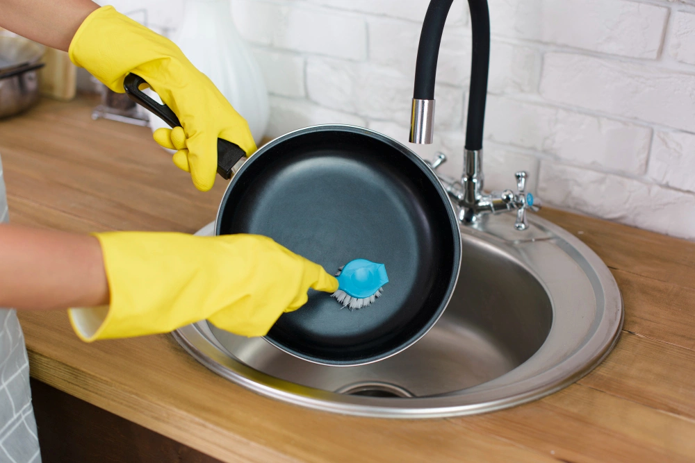 how to clean a cast iron skillet, cast iron skillet maintenance 2026, re-season cast iron pan, remove rust from cast iron, clean cast iron without soap, Sarah Jenkins cookware care