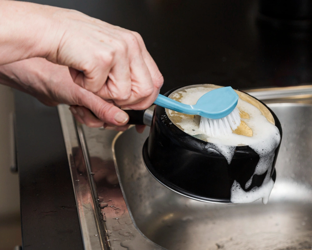 how to clean a cast iron skillet, cast iron skillet maintenance 2026, re-season cast iron pan, remove rust from cast iron, clean cast iron without soap, Sarah Jenkins cookware care