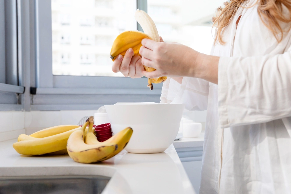 how to keep bananas fresh longer, prevent bananas from browning, store bananas 2026, why do bananas turn brown, banana storage hacks, Sarah Jenkins food preservation tips