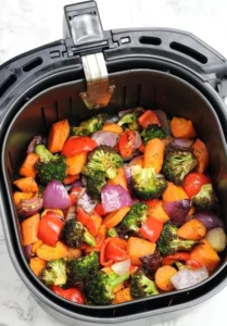 air fryer recipes for beginners, easy air fryer meals, what to cook in air fryer first time, simple air fryer cooking 2026, beginner air fryer tips, Sarah Jenkins air fryer guide