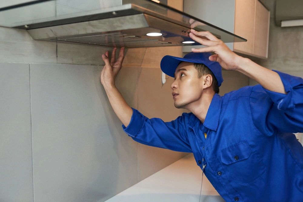 how to clean a kitchen exhaust fan, degrease range hood filter, clean exhaust fan grease 2026, kitchen hood cleaning hacks, remove grease from exhaust fan, Sarah Jenkins kitchen maintenance.