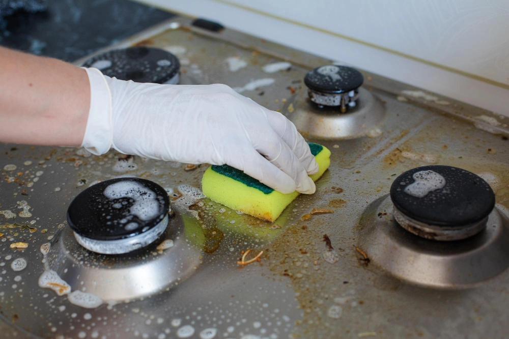 how to clean a stove top without scratching it, clean glass stove top naturally, remove burnt food from stove top, stove top cleaning hacks 2026, scratch free stove cleaning, Sarah Jenkins kitchen cleaning tips