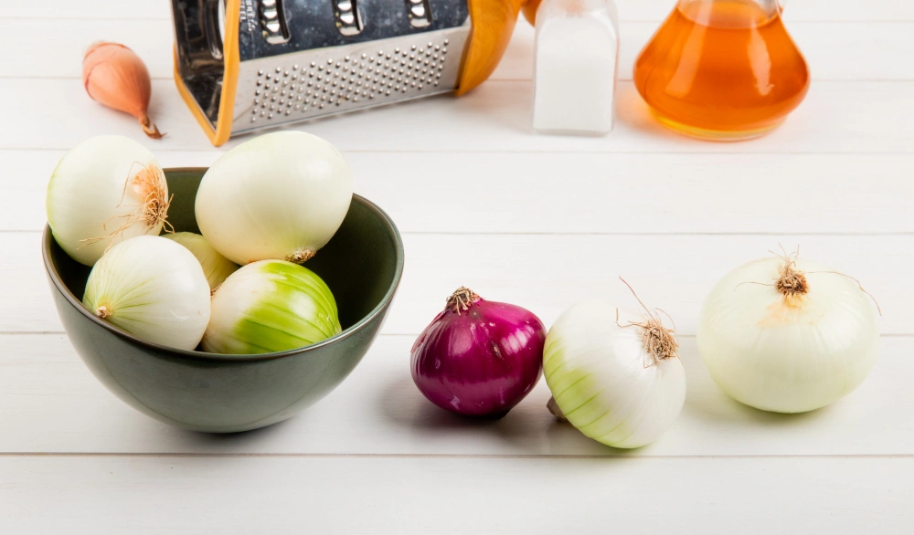 how to keep onions fresh longer, onion storage hacks 2026, best way to store onions, keep cut onions fresh, prevent onions from sprouting, Sarah Jenkins food preservation tips.