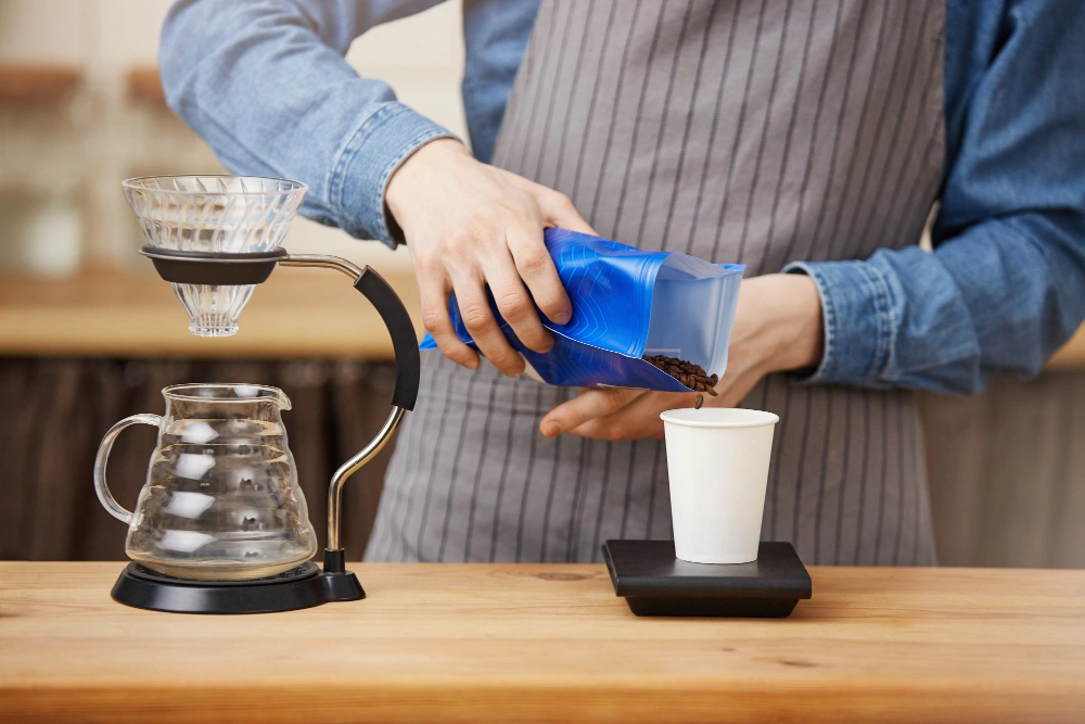 how to descale a coffee maker, how to clean a coffee maker, how to clean coffee maker with vinegar, descale coffee maker with vinegar, how to descale ninja coffee maker, how to descale breville coffee maker, coffee maker cleaning tips 2026