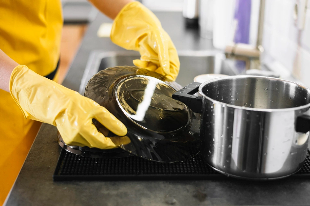 how to clean stainless steel pans, how to clean stainless steel cookware, how to remove burnt food from stainless steel pan, how to make stainless steel pans shine, how to clean discolored stainless steel, stainless steel pan cleaning tips 2026